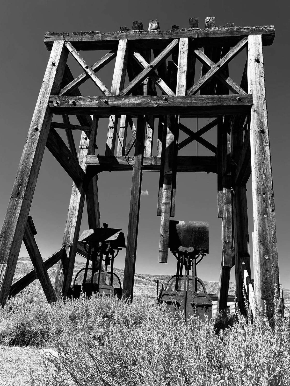 Historic mine structure in black and white